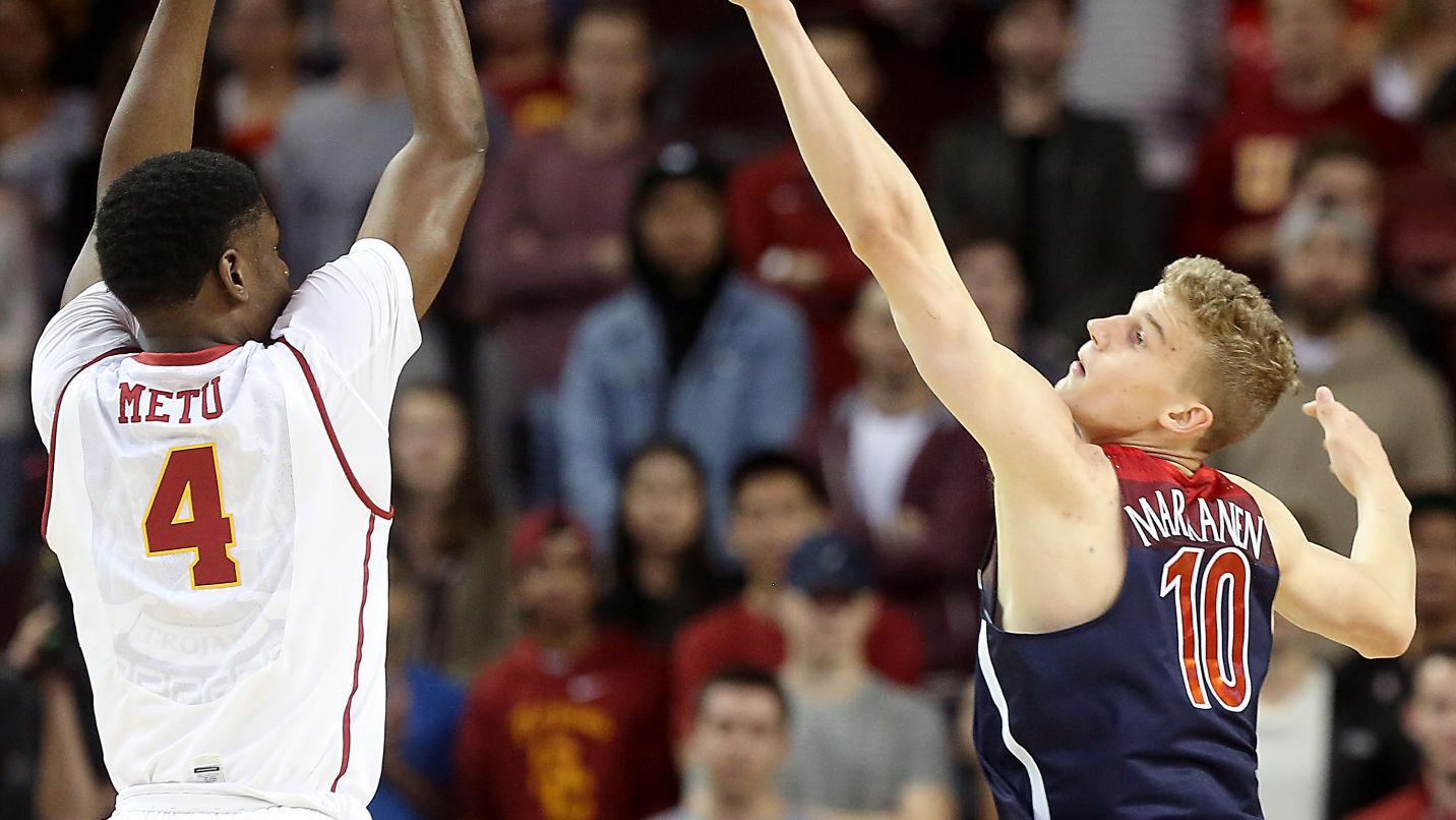 Wildcats stop Trojans' 3s with some early, effective 'D'